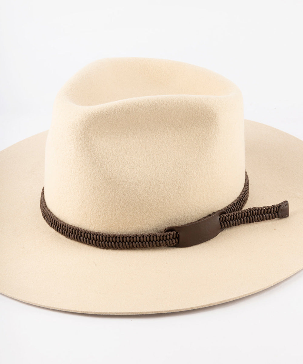 A light beige felt fedora hat with a dark brown braided band and matching brown buckle, shown on a clean white background #color_dark brown