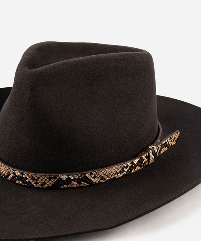 A dark brown felt cowboy hat featuring a decorative band with a black, brown, and beige snakeskin pattern, shown against a plain white background #color_brown