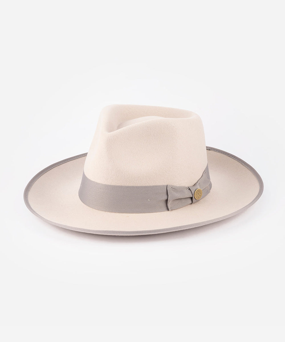 Beige fedora hat with a gray band on a white background #color_ivory