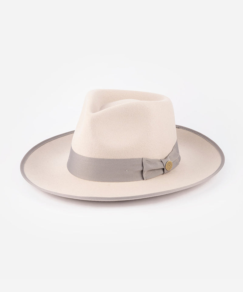 Beige fedora hat with a gray band on a white background #color_ivory