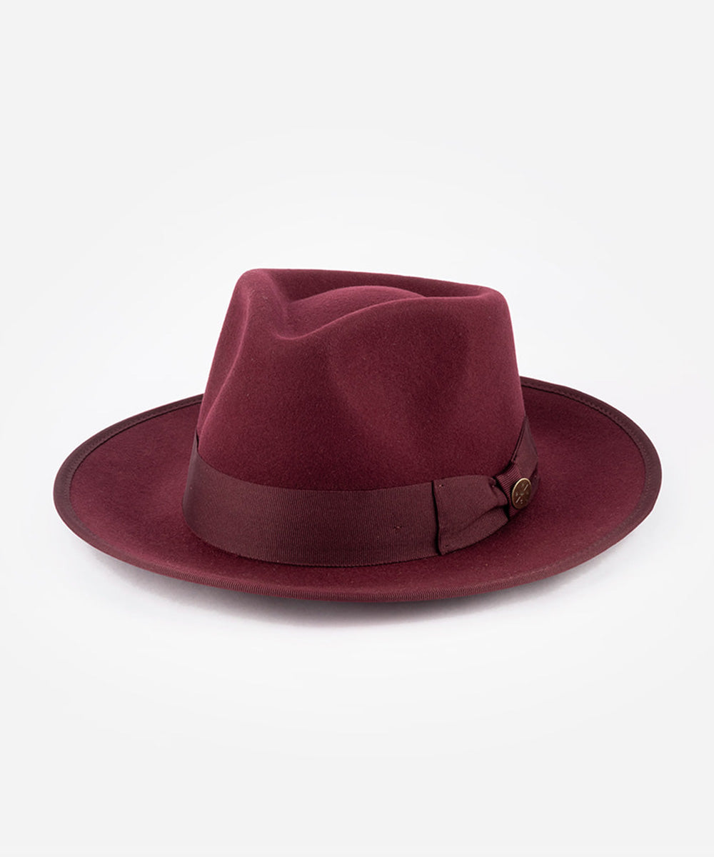 Maroon fedora hat with a band on a white background #color_maroon