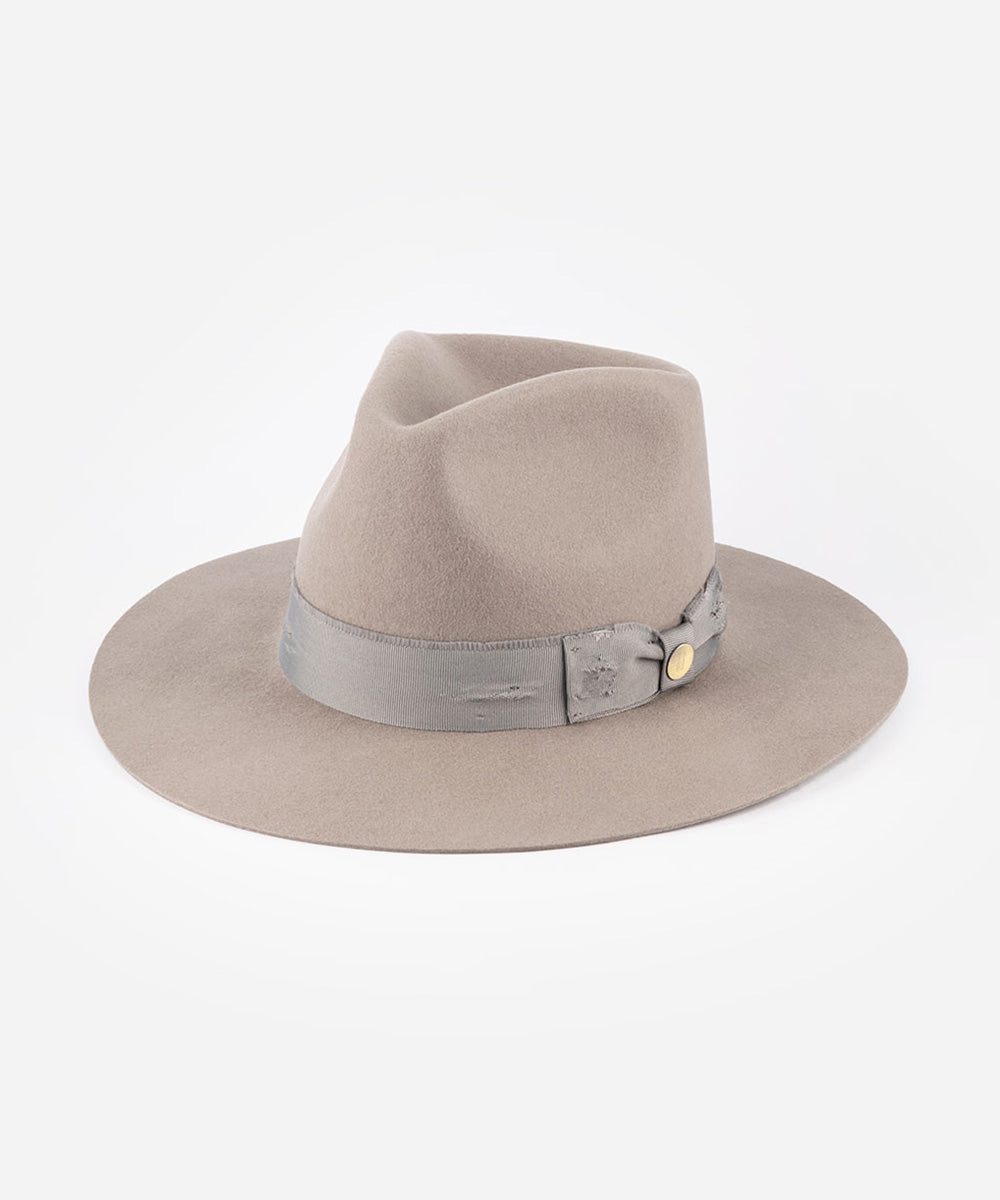 Beige fedora hat on a plain background #color_stone