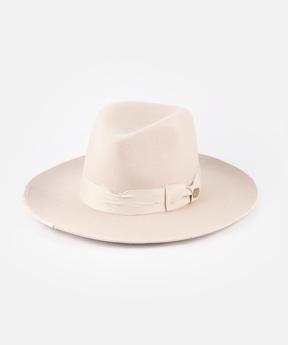 Beige fedora hat with a ribbon on a white background #color_ivory