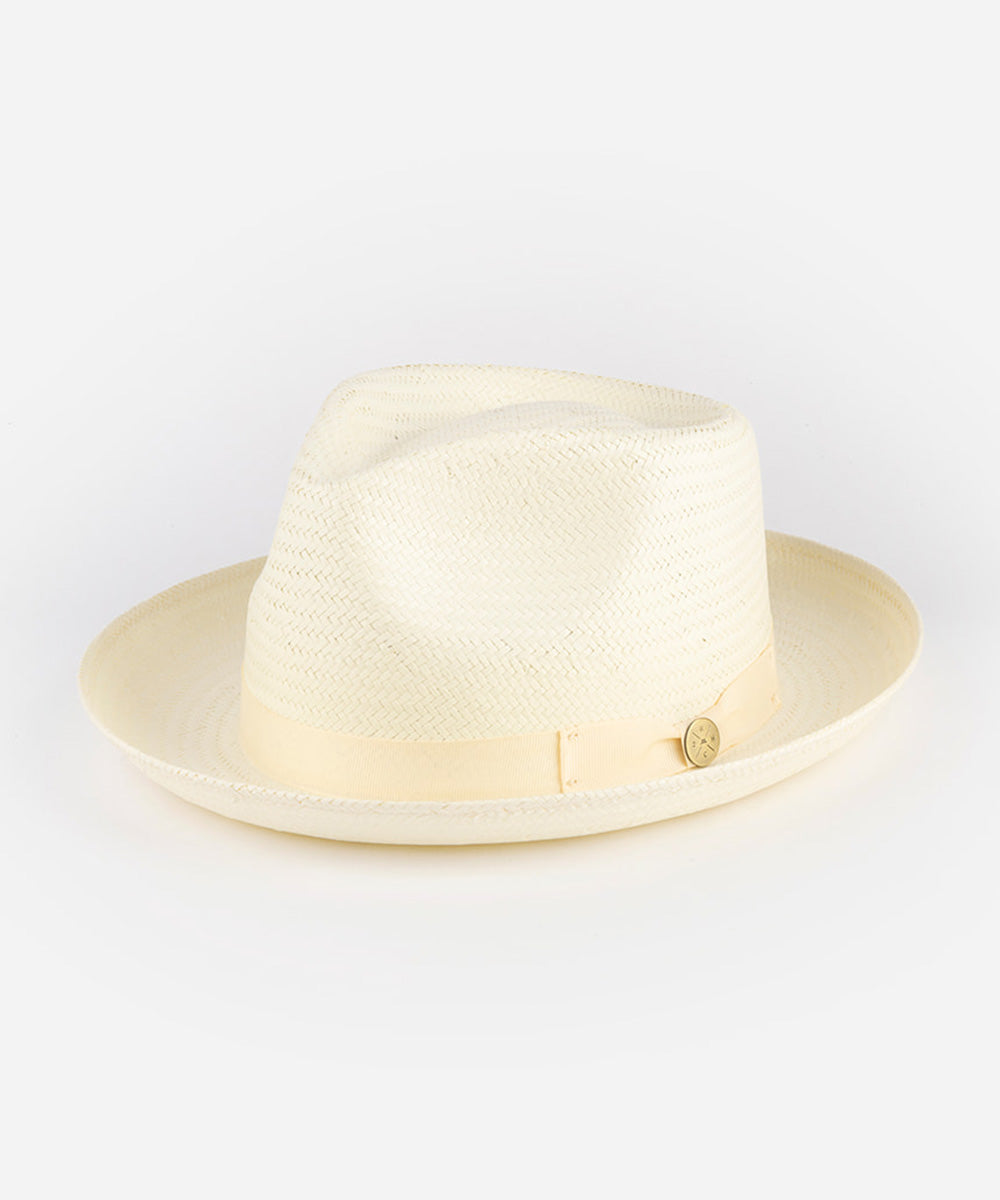 Beige fedora hat with a band on a light gray background #color_cream