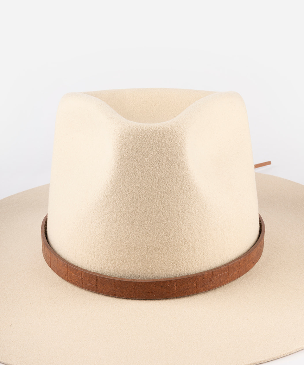 A cream-colored felt cowboy hat with a brown textured band, shown from a front-facing angle against a plain white background #color_brown