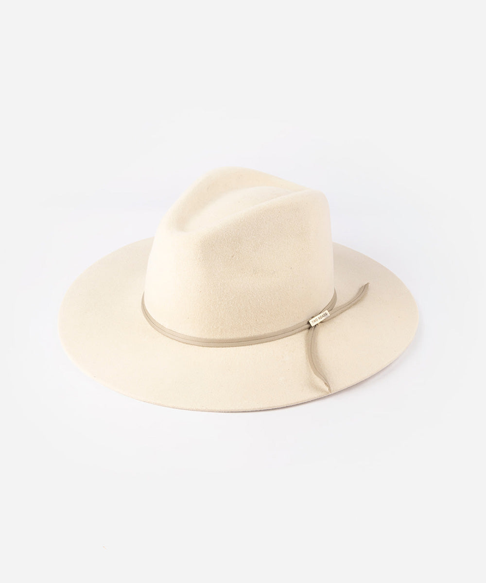Cream cowboy hat with a band in a white background #color_buckskin