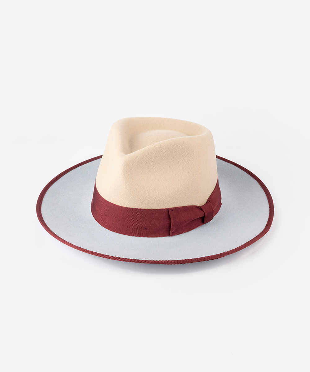 Rancher hat with a decorative band in a white background