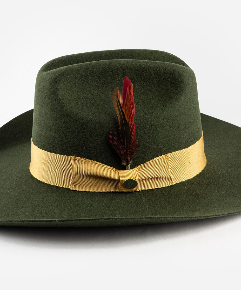 Green cowboy hat with a gold band and feather on a white background #color_forest green mustard